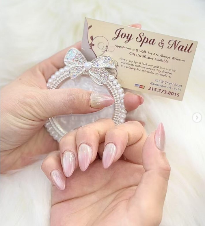 Soft pink manicure detail at JoySpaNail