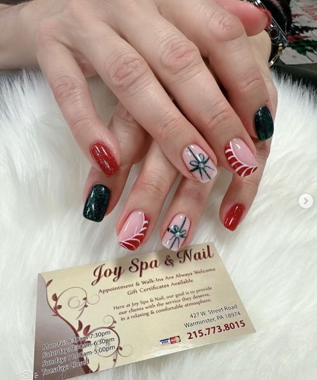 Red and black nail design detail at JoySpaNail