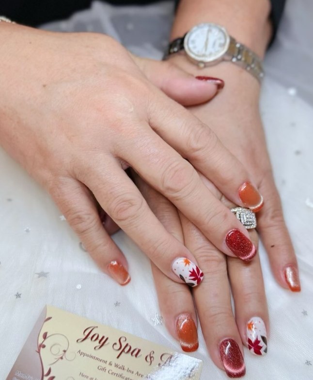 Red floral nail detail at JoySpaNail
