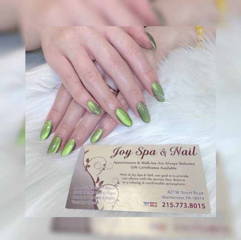 Green nail design detail at JoySpaNail